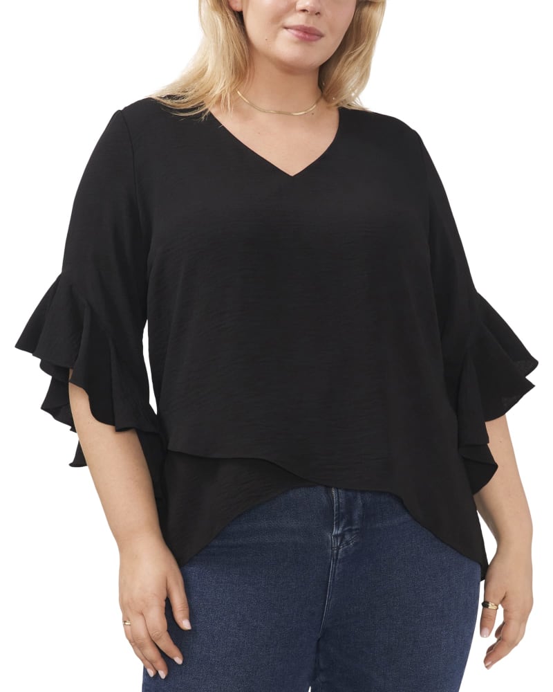 Front of a model wearing a size 1X Willow Flutter Sleeve Blouse in RICH BLACK by Vince Camuto. | dia_product_style_image_id:261398